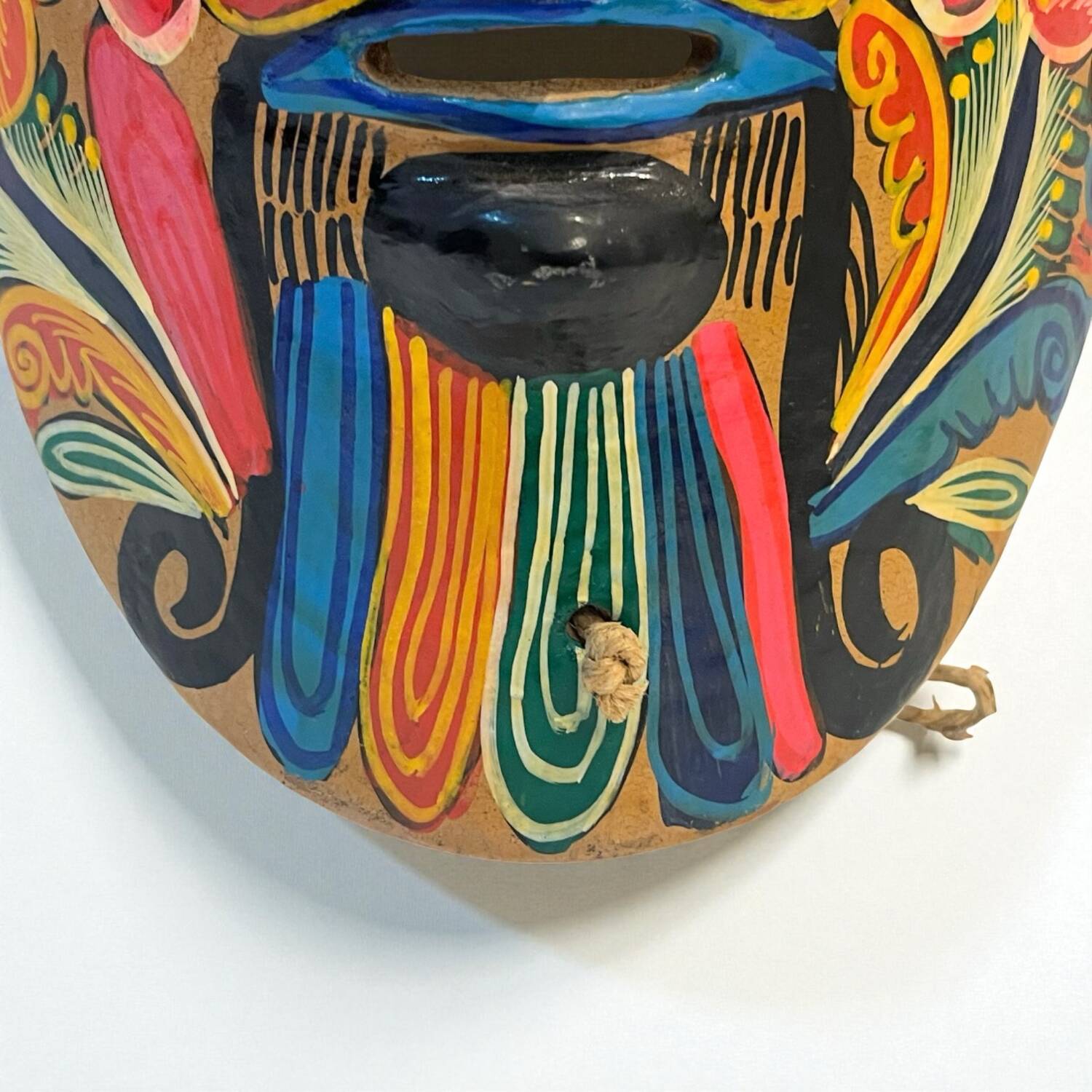 Mexican folk art mask in colored terracotta, 1970s
