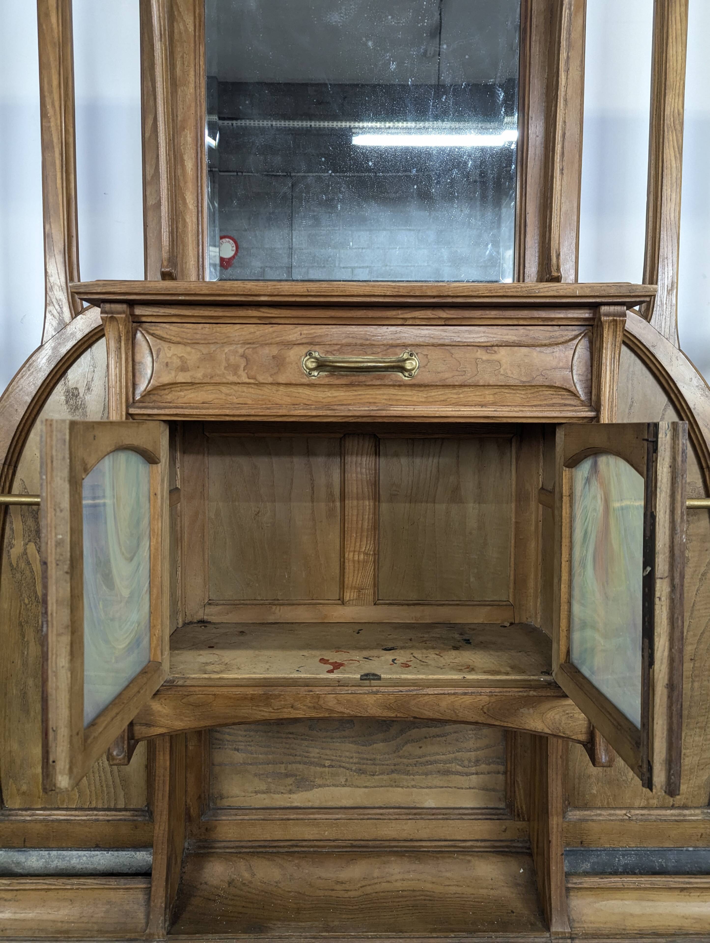 Large Art Nouveau cloakroom in the style of Van de Velde.