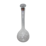 Glass bottle with its cap