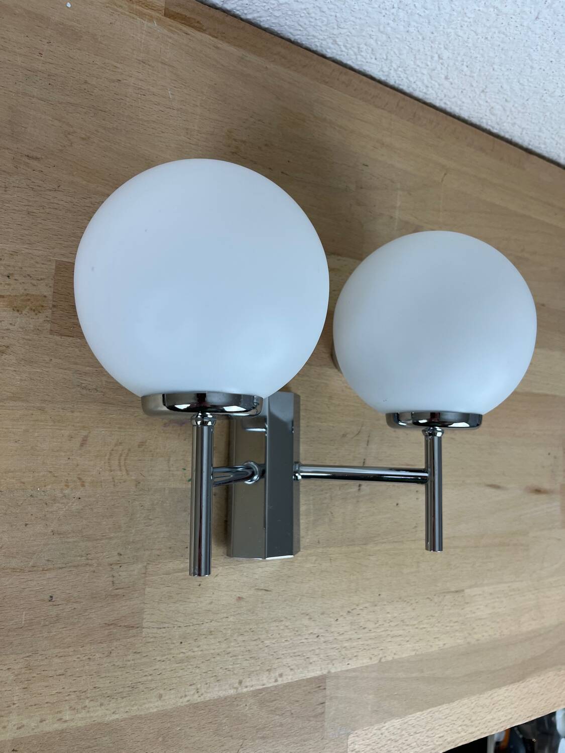 Opaline and chrome globe wall light from the 1970s
