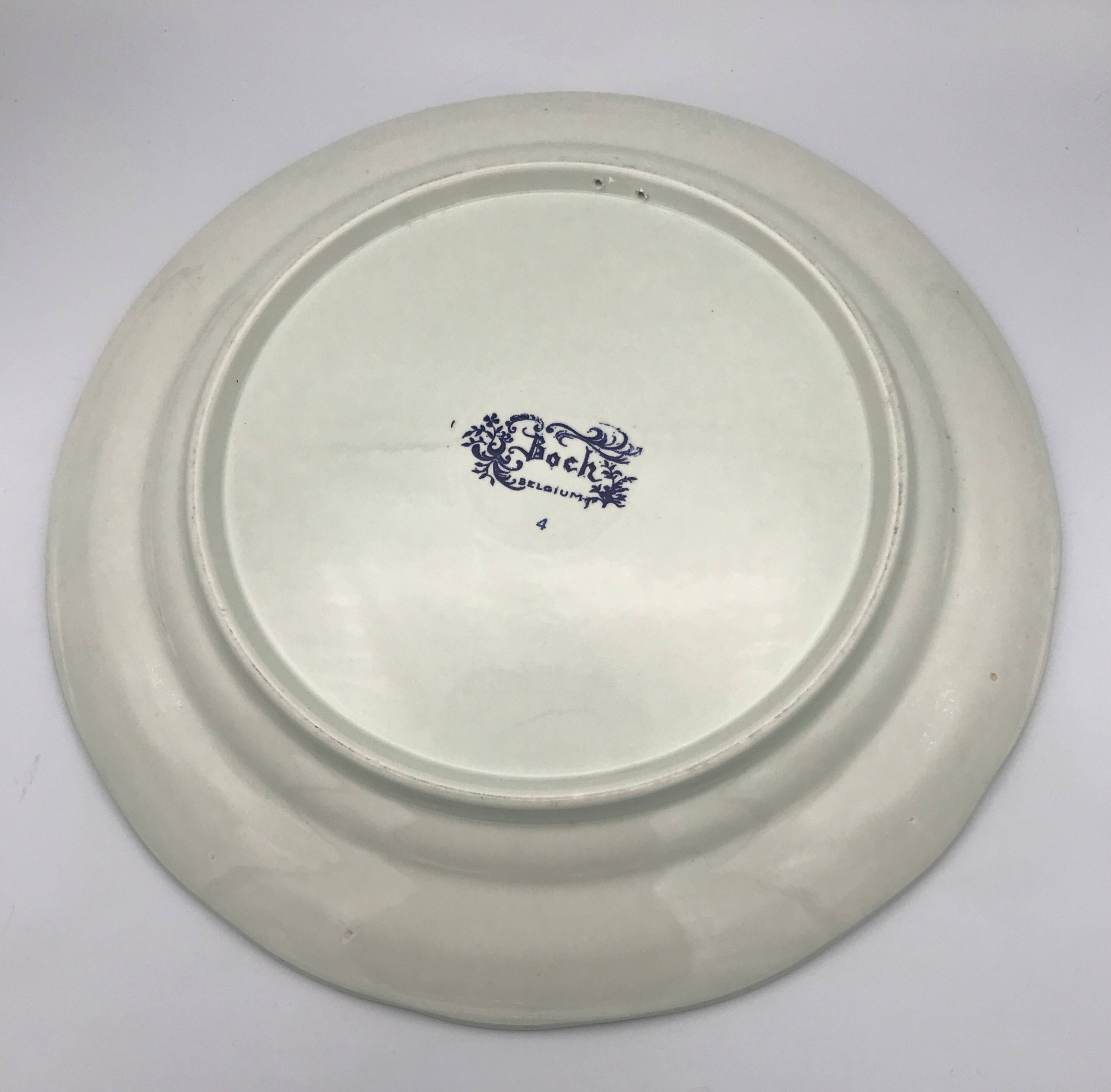 Blue enamelled earthenware wall plate with fisherman decor, Boch La Louvière, Belgium