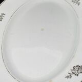 Oval serving dish with flower pattern and silver border
