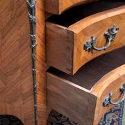 Old French secretary in bronze and wood marquetry.