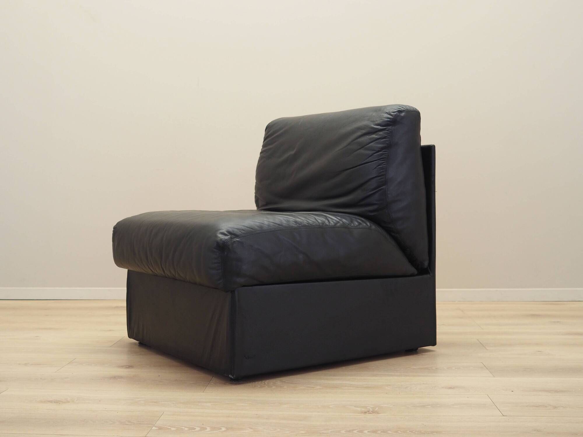 Black leather pouf/armchair, Italian design, 1960s, made in Italy.