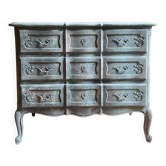 Antique Louis XV style commode, aged finish, practical elegance.