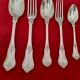 Antique silver-plated monogrammed cutlery set