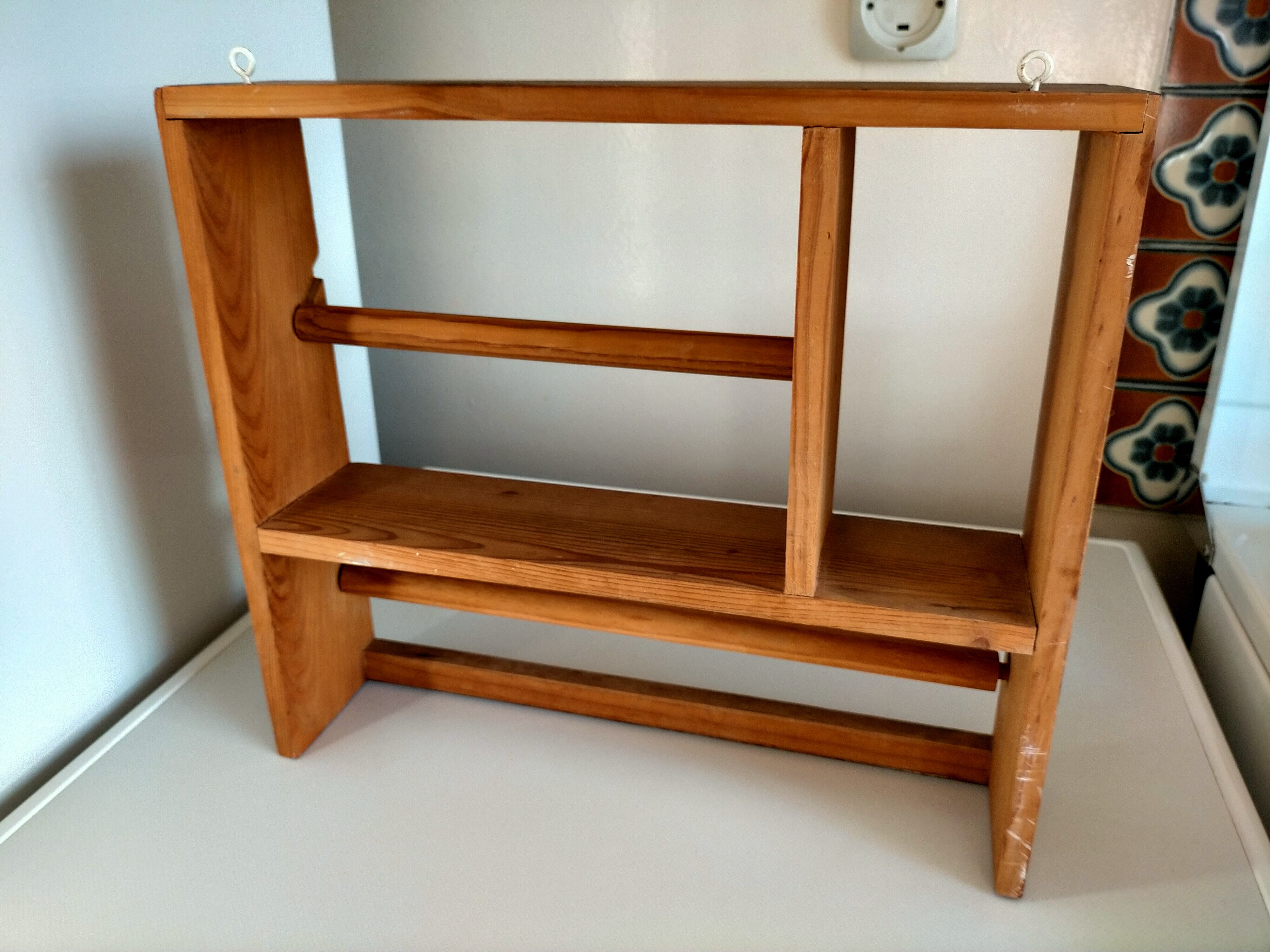 Wooden shelf with unroller wipes everything