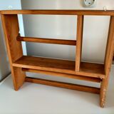 Wooden shelf with unroller wipes everything