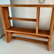 Wooden shelf with unroller wipes everything