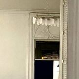 Louis XVI style mirror in wood and carved stucco 20th century