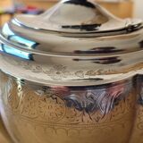 Chiseled silver teapot