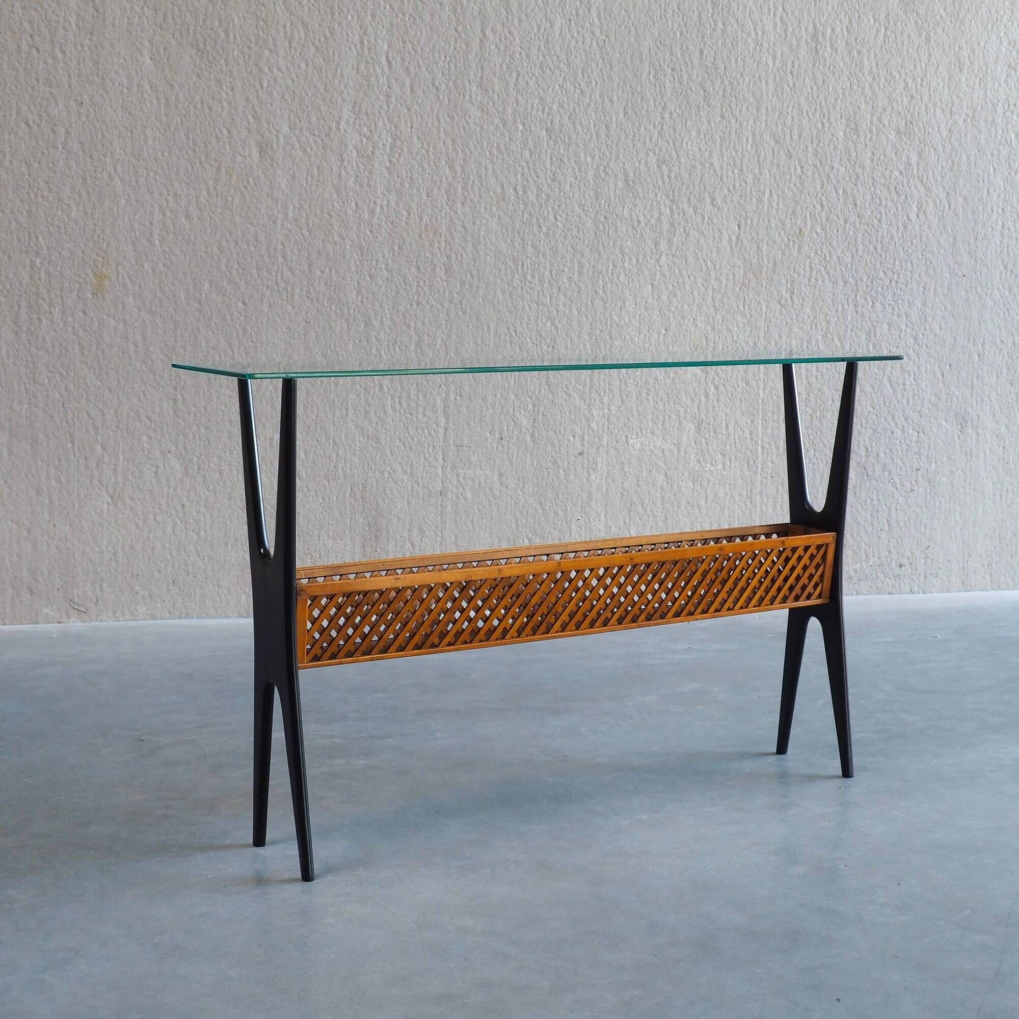 1950s Italian ebonized console table with glass top & lattice basket