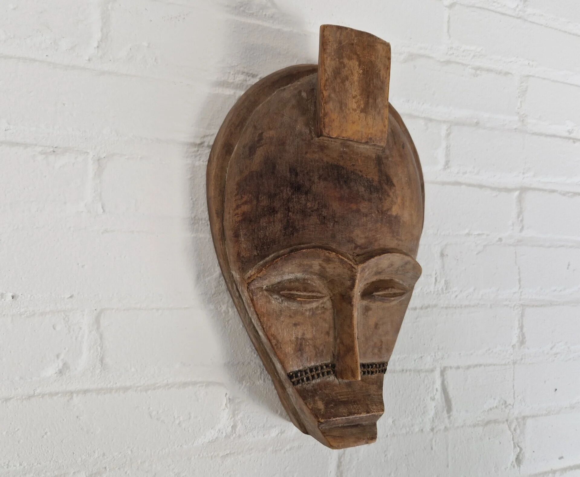 20th century carved African tribal mask