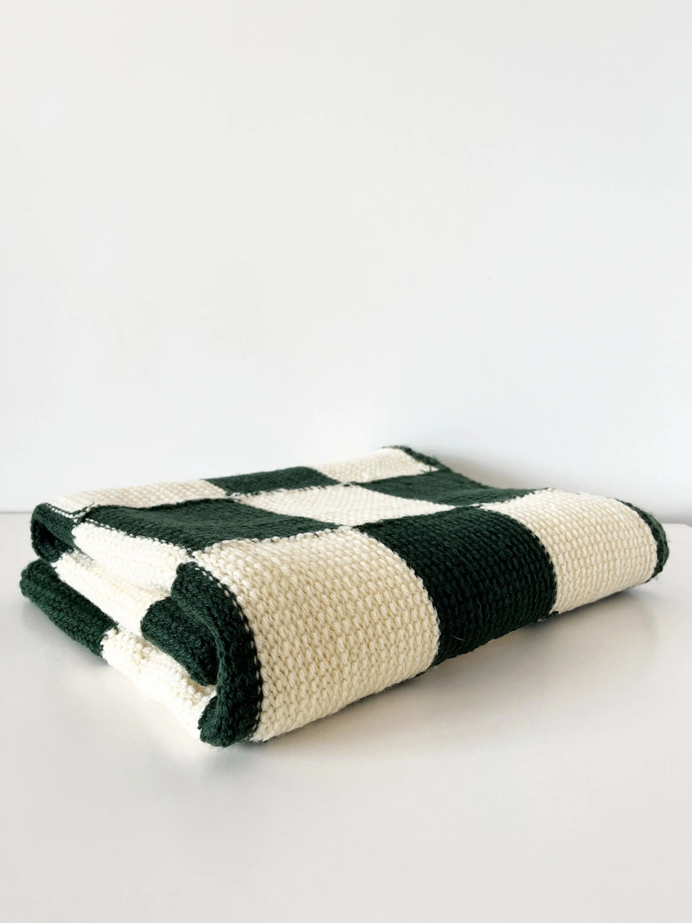 Handmade knitted wool vichy blanket