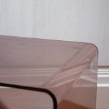 Vintage trio of nesting tables in smoked plexiglass by Michel Dumas, year.