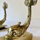 Brass wall supports for bathroom shelf, circa 1950.