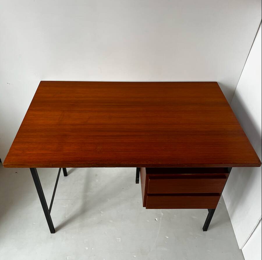 Vintage wooden and metal desk in modernist style.