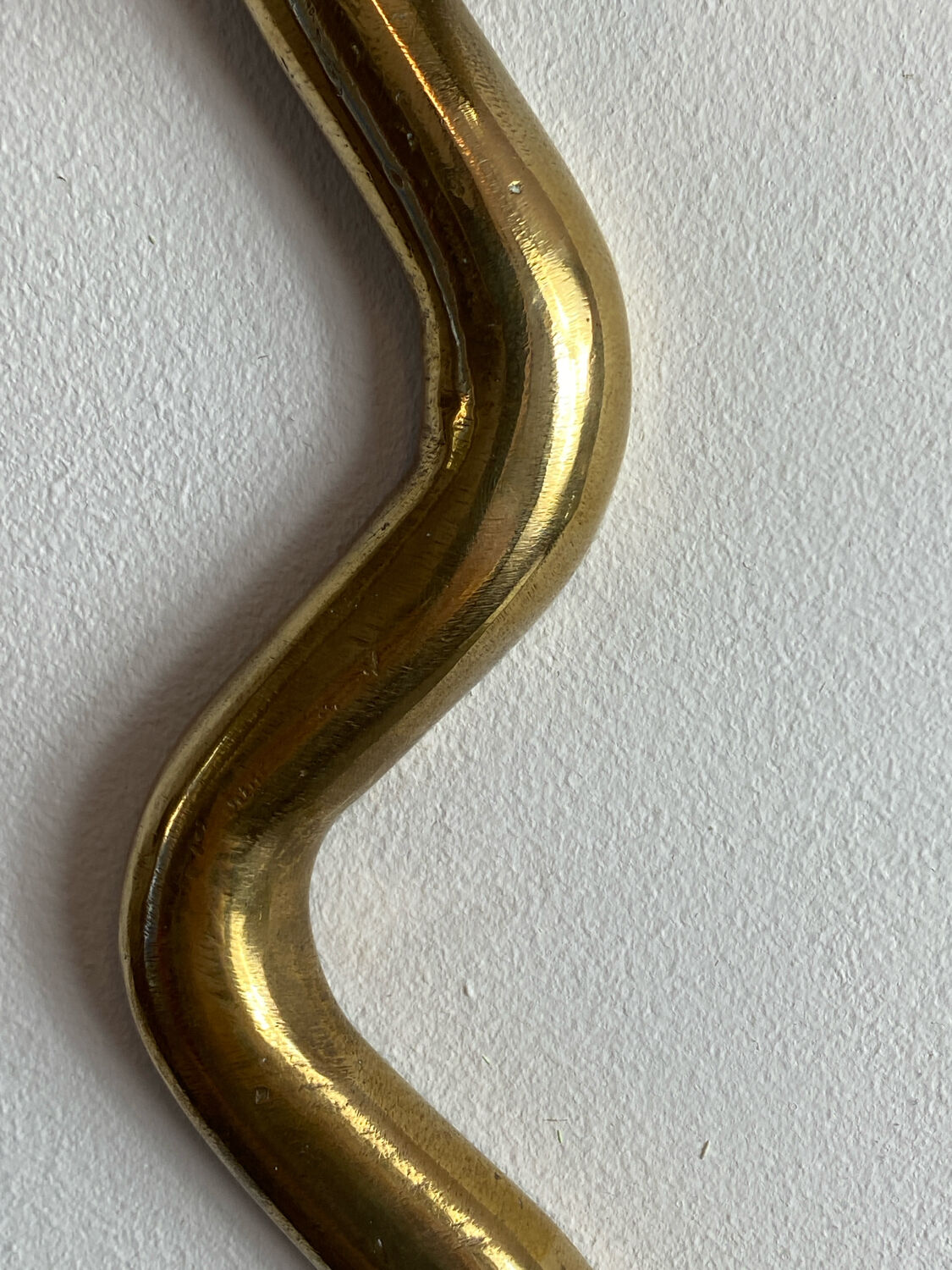 Large brass cobra wall candle holder
