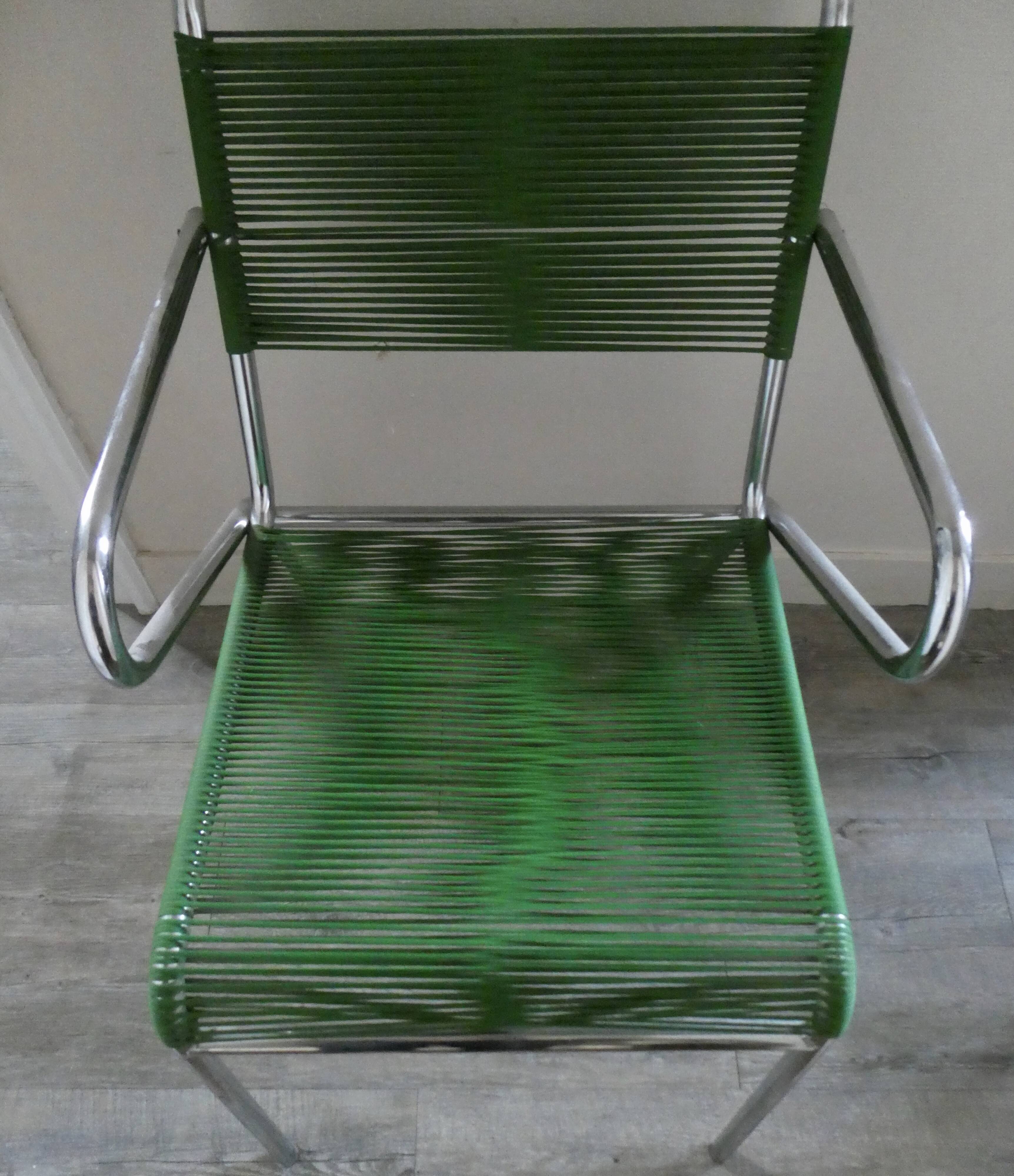 Metal chair and ropes