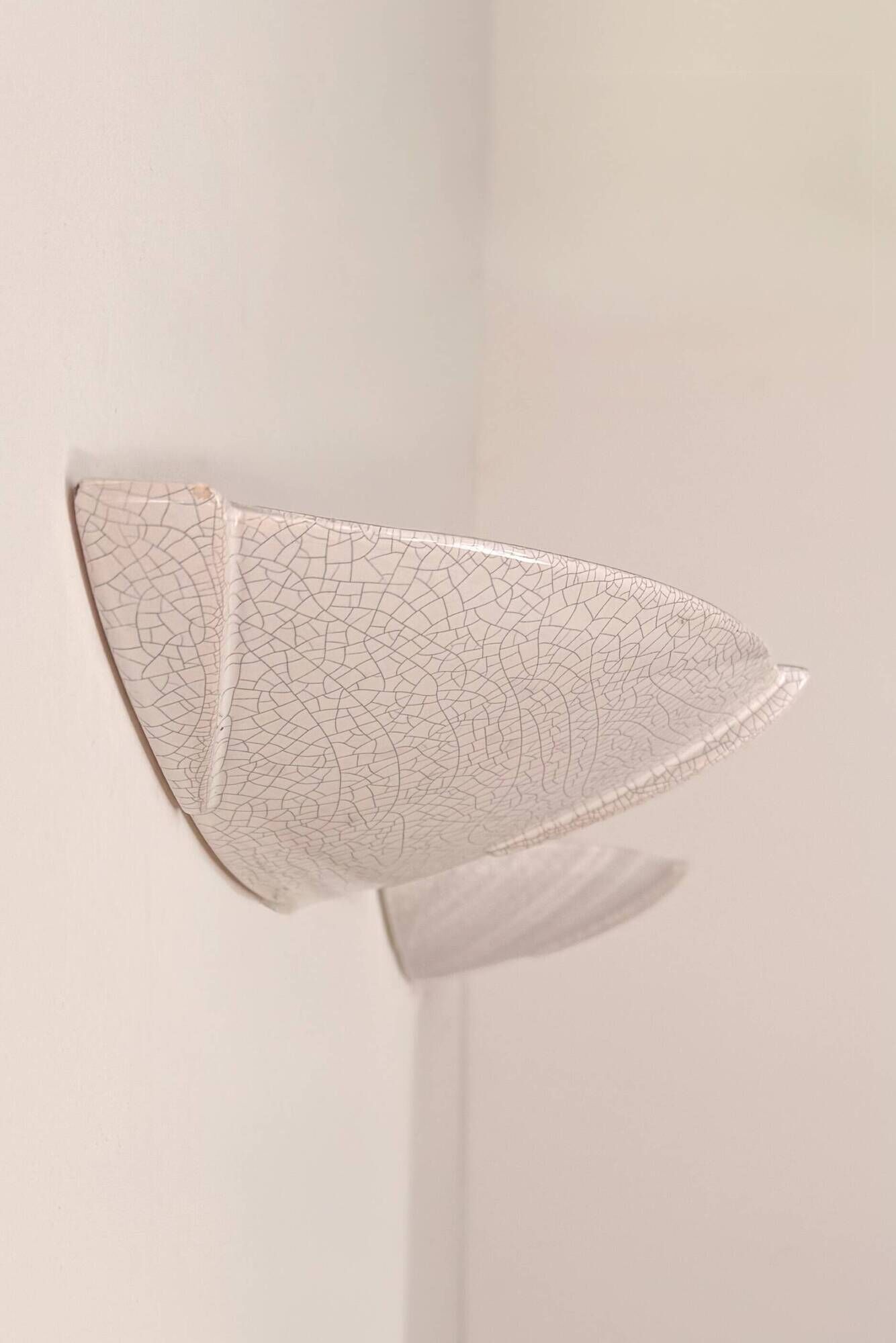 Pair of vintage wall lights in glazed white porcelain, France 1970.