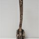Four patères bronze patinated leafy décor early 20th century