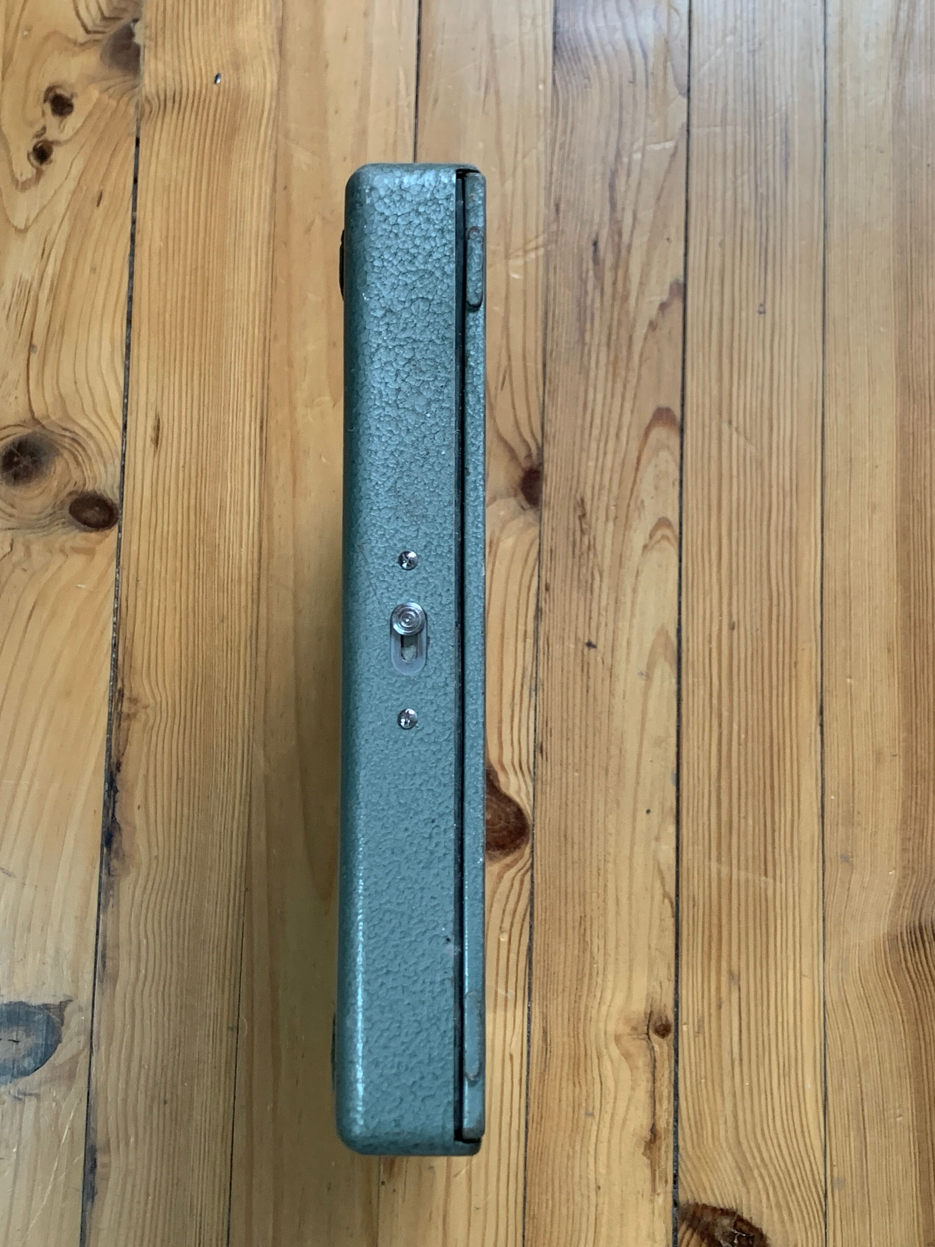 M.J. Rooy light green typewriter