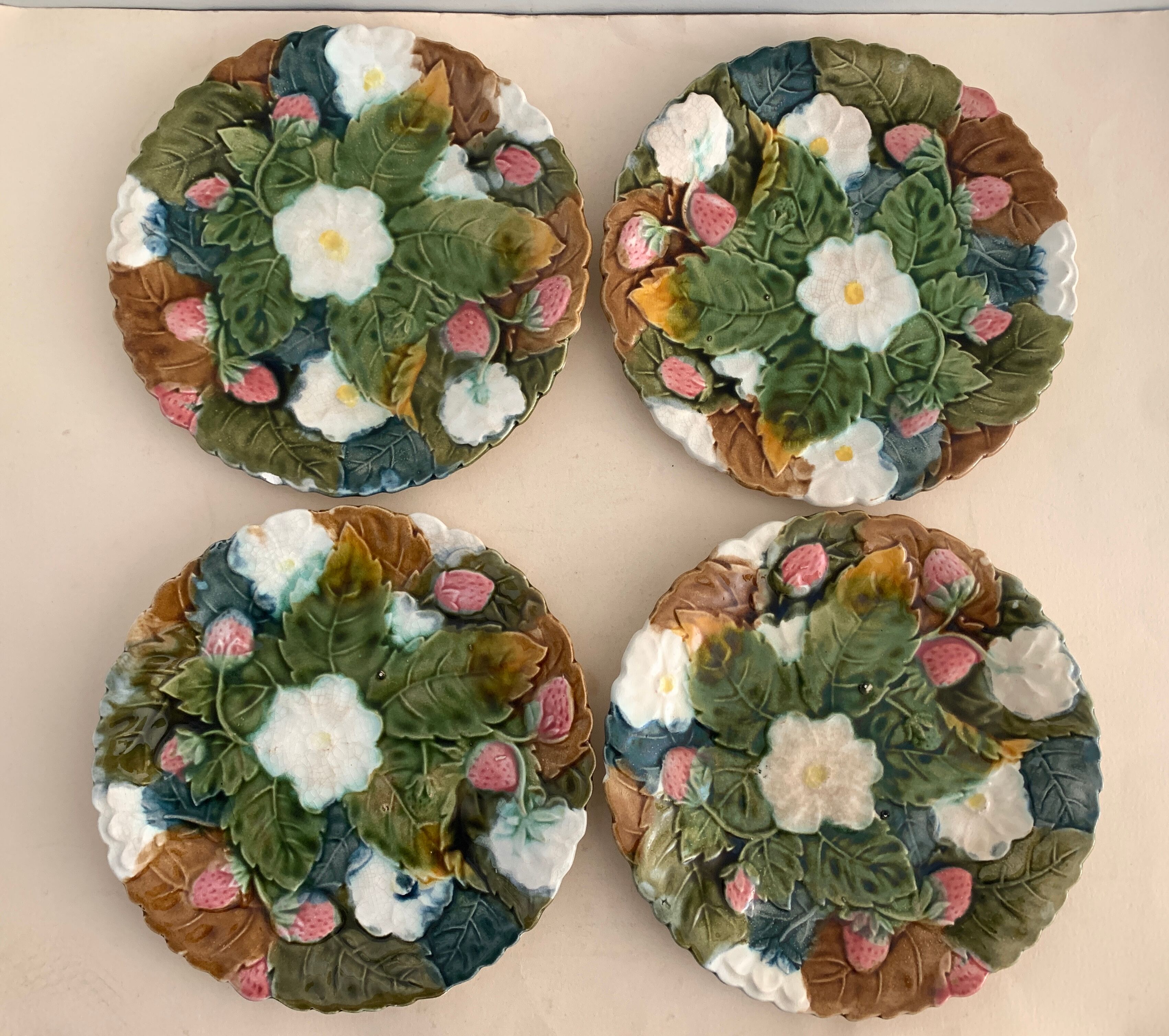 4 old and numbered dessert plates in slurry, strawberry model