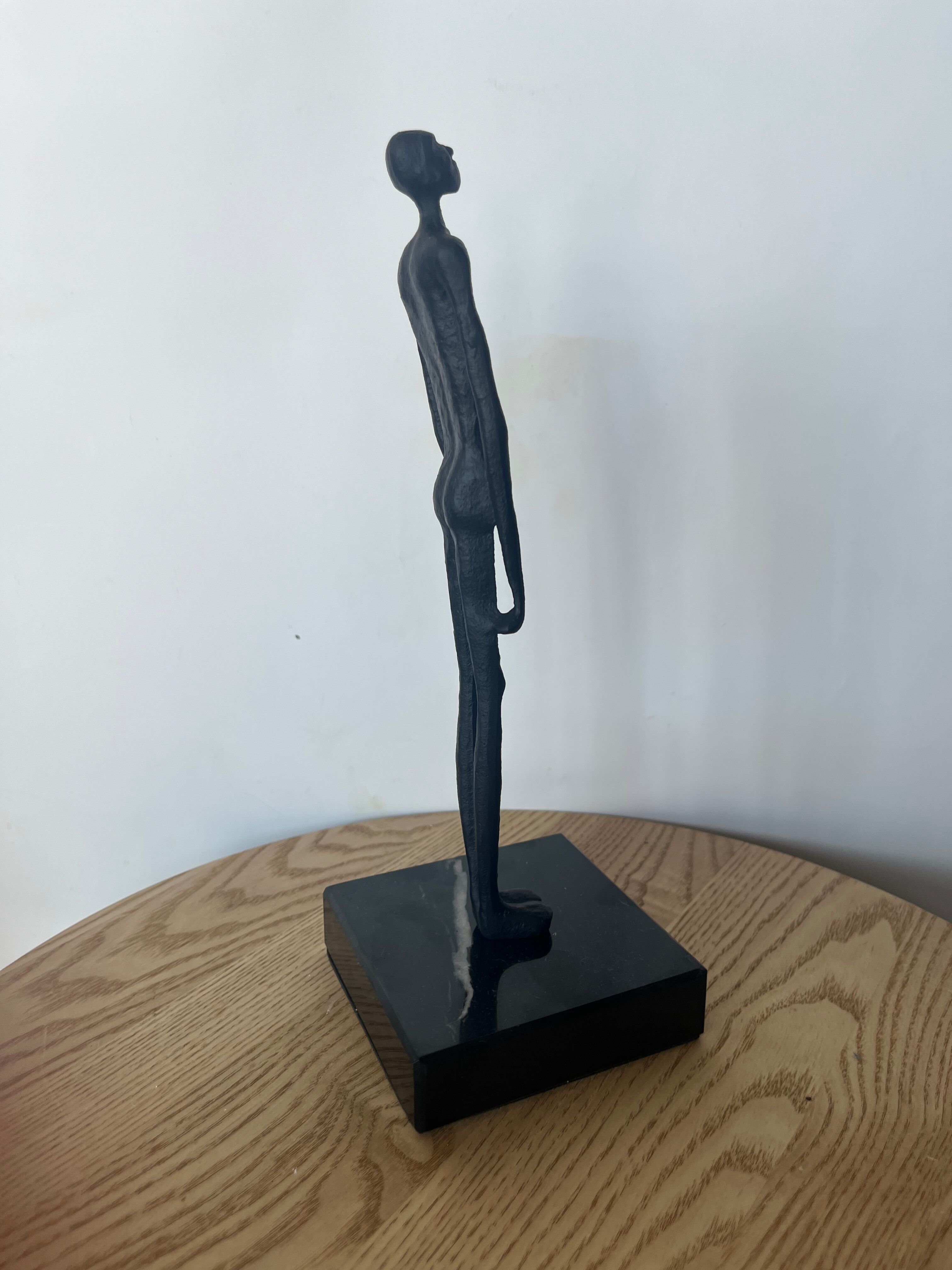 Standing Man by Giacometti