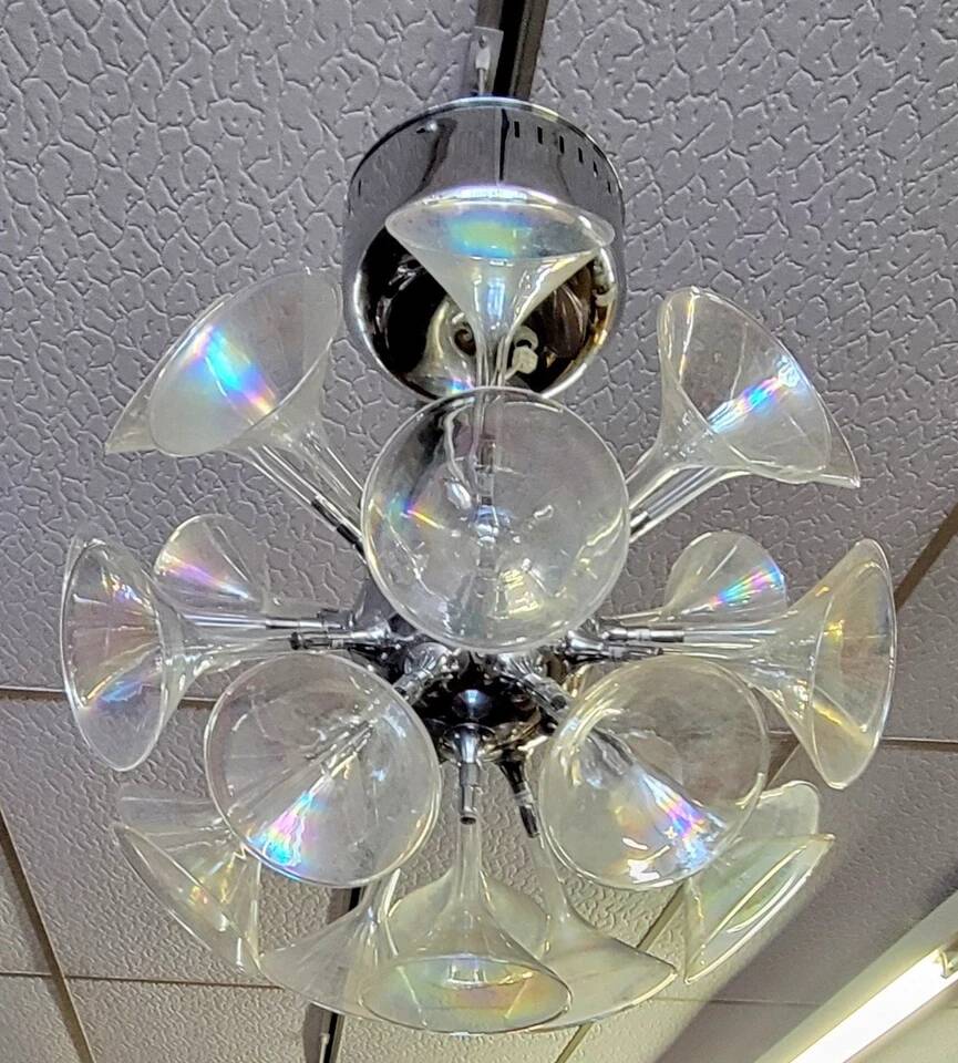 According to Goffredo Reggiani: trumpet chandelier or champagne flute