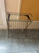 Vintage side table with glass and gold metal.