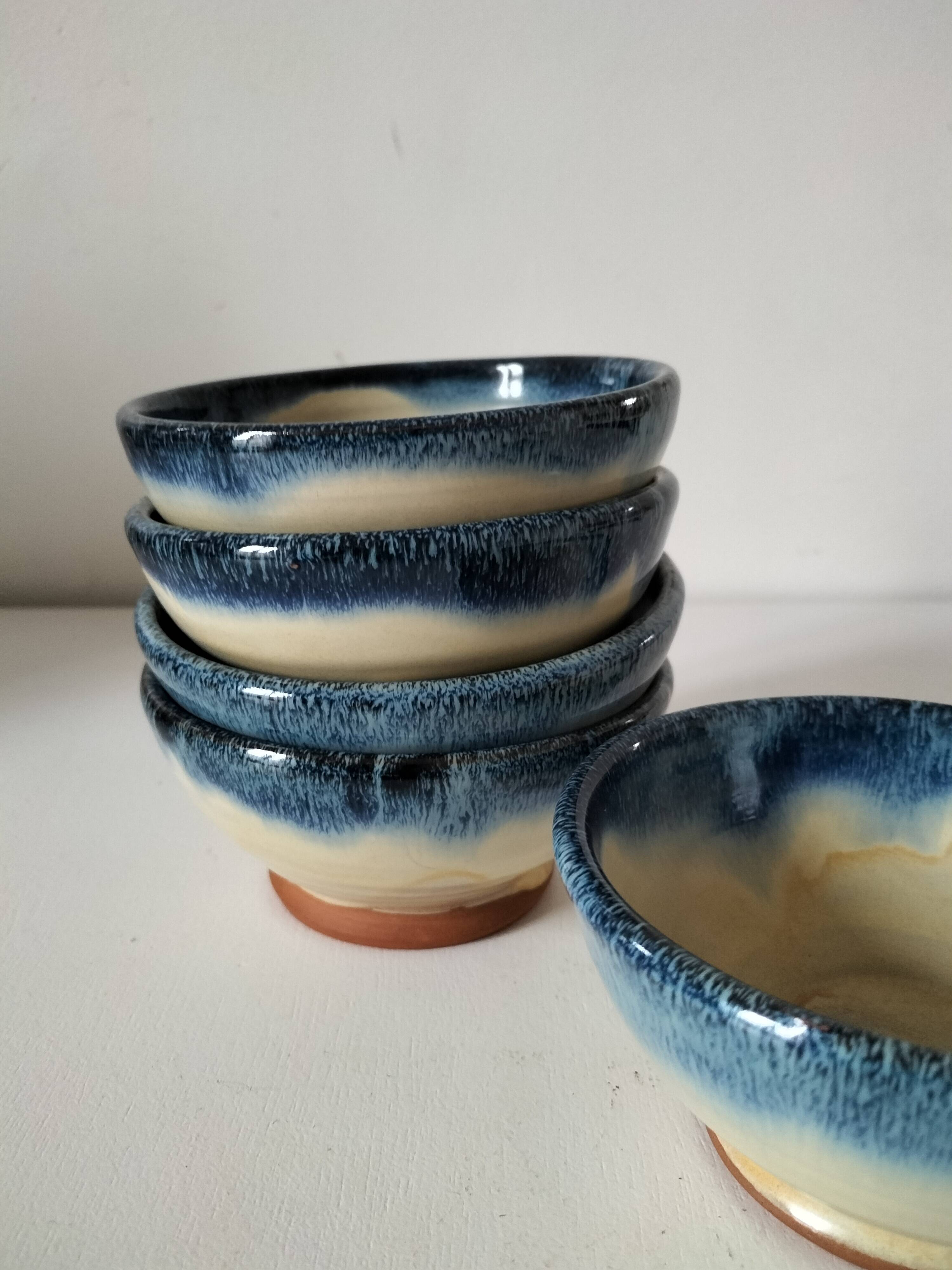 Set of 5 small blue and cream glazed stoneware bowls