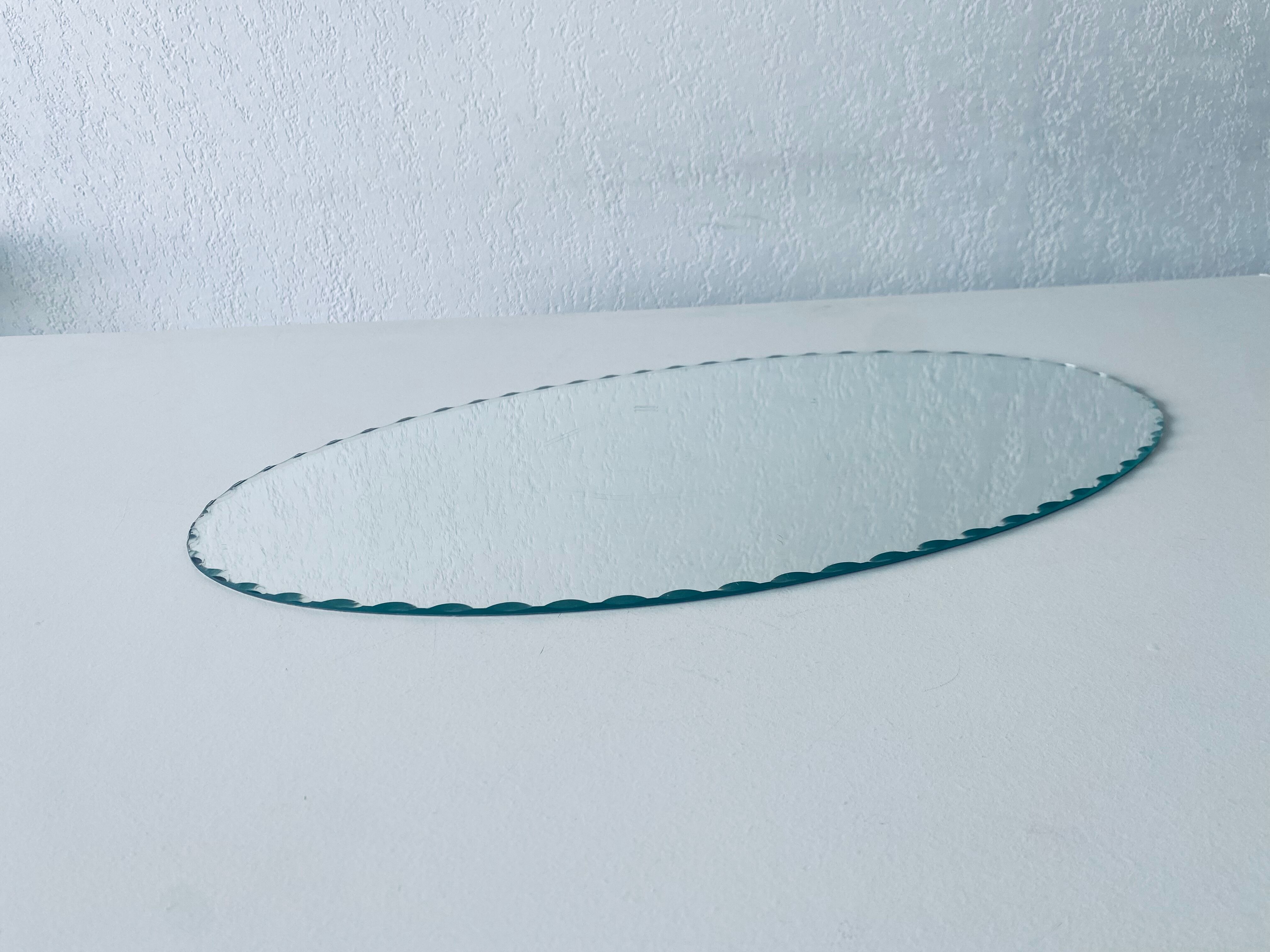 Oval beveled mirror 50x25cm