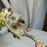 Bronze hand candlestick in the shape of a peacock