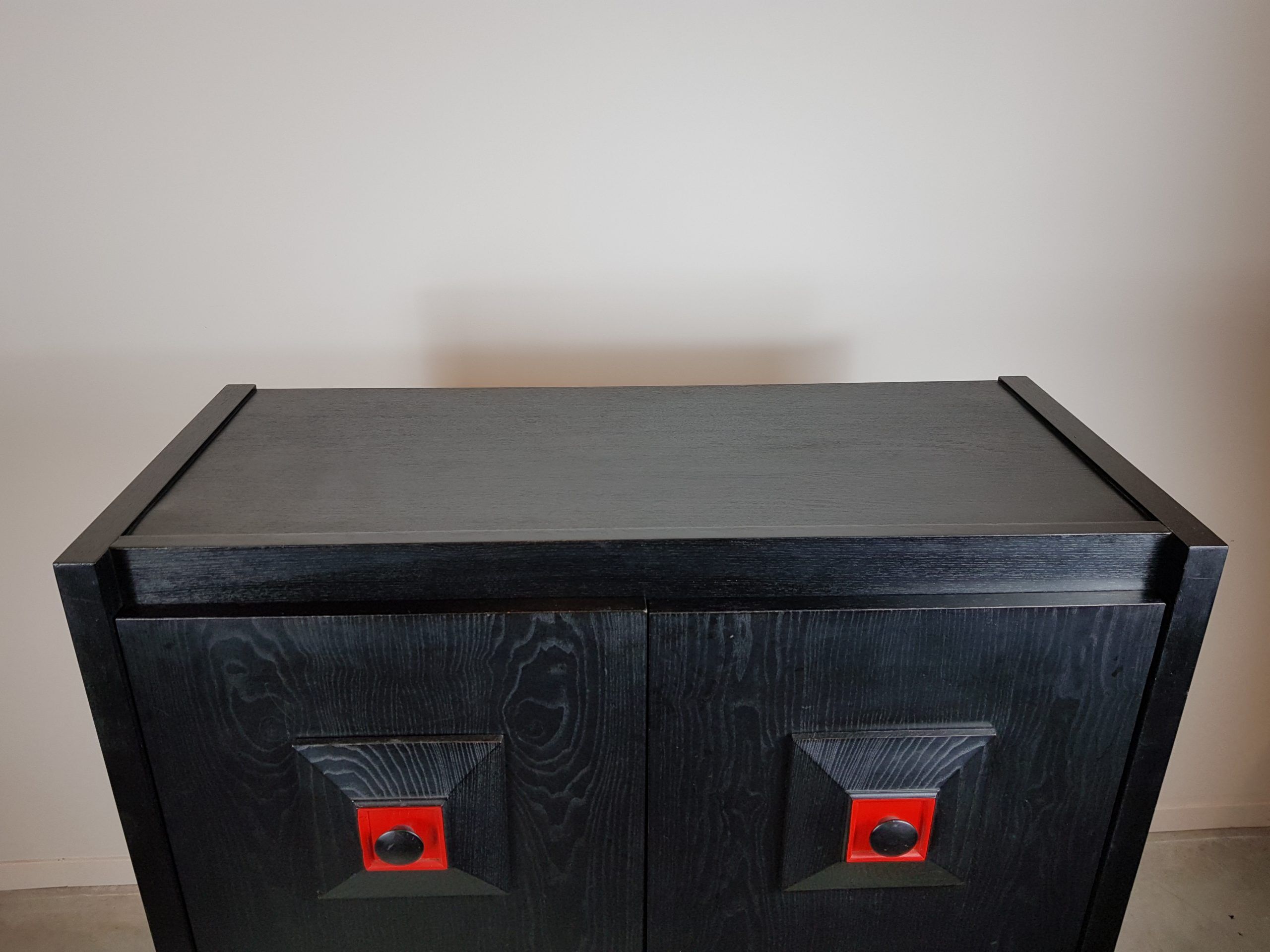 Black and red wooden brutalist bar