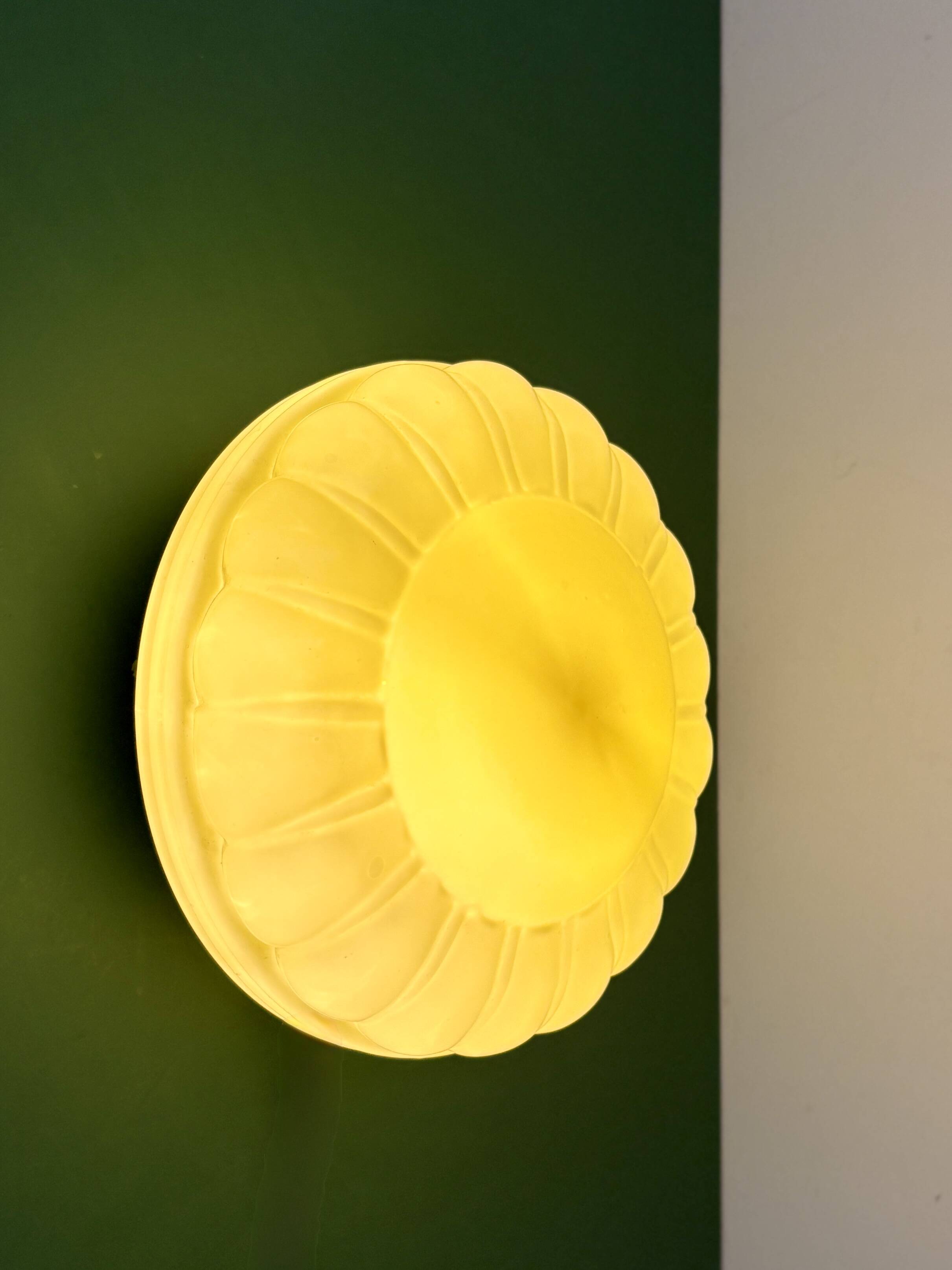 Vintage Art Deco globe wall or ceiling light in yellow opaline.