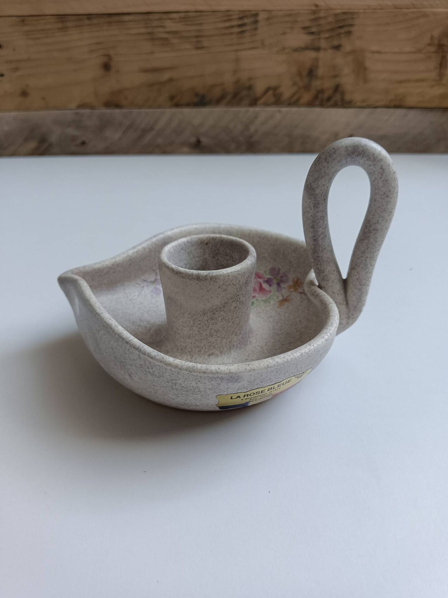 Vallauris grey candle holder with pink flowers, signed.