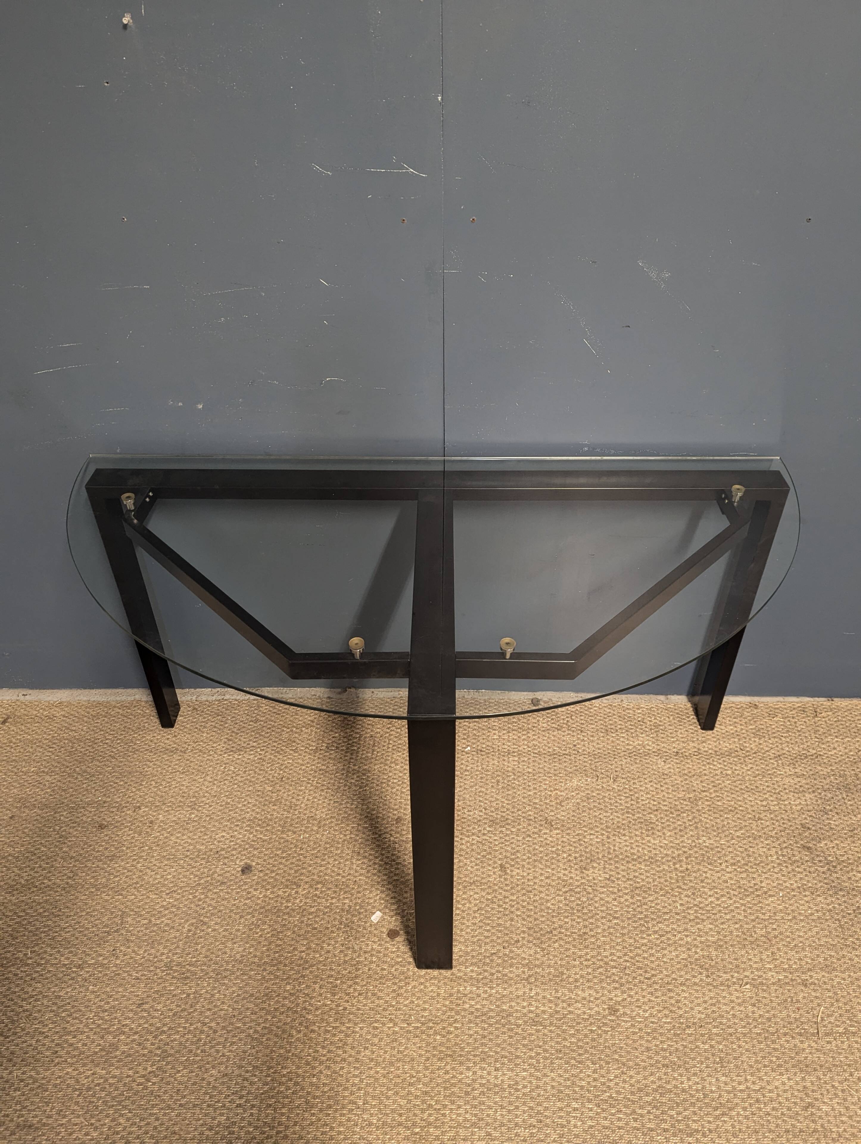 Black metal console with glass top