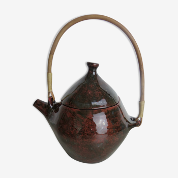 Asymmetrical ceramic teapot