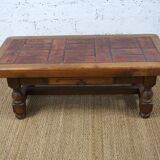 Coffee table with ceramic top and herbarium decor by pierre garnier