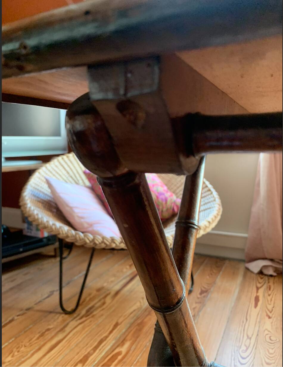 Folding mahogany table with a mirror top.