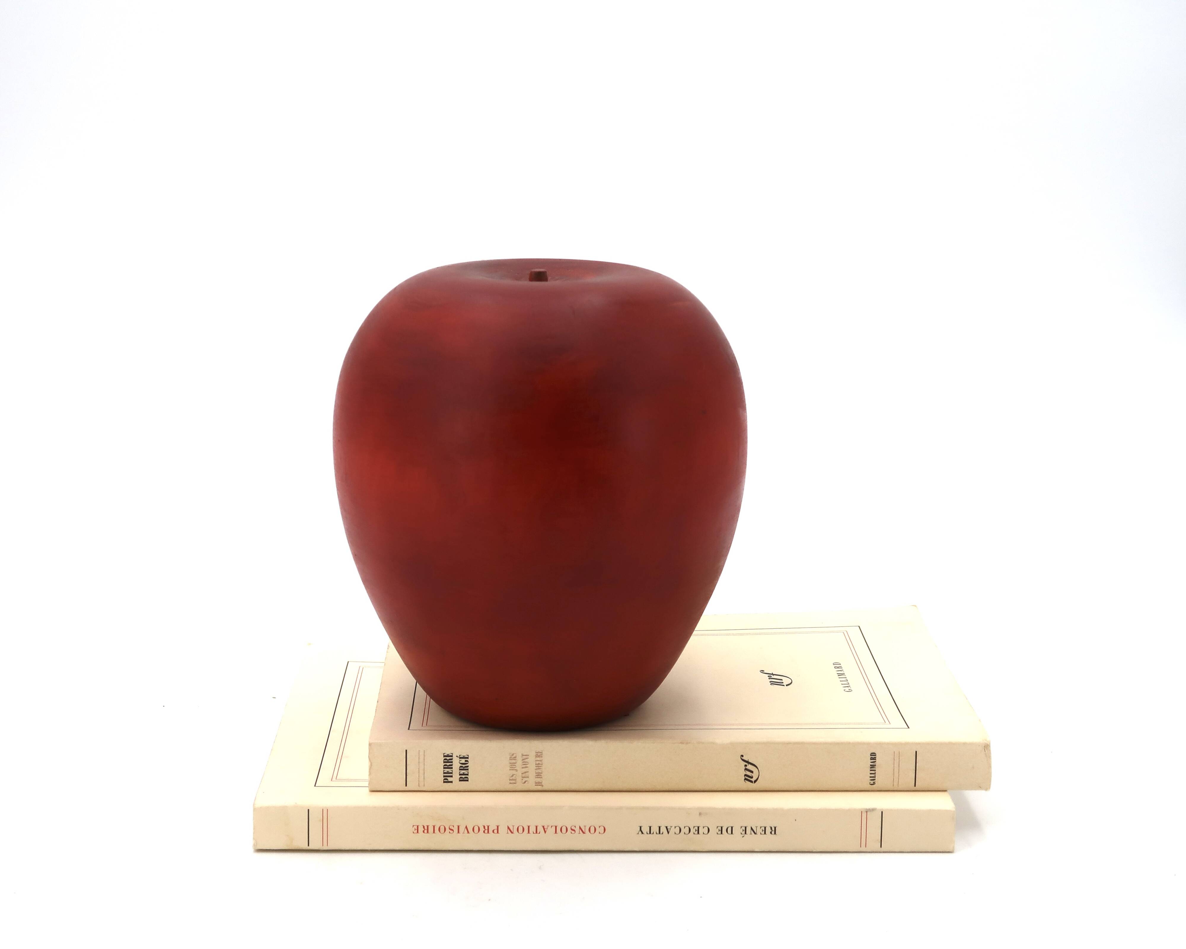 Sculpture of a giant red apple in wood, 1960s