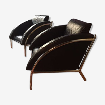 Pair of vintage black leather armchairs