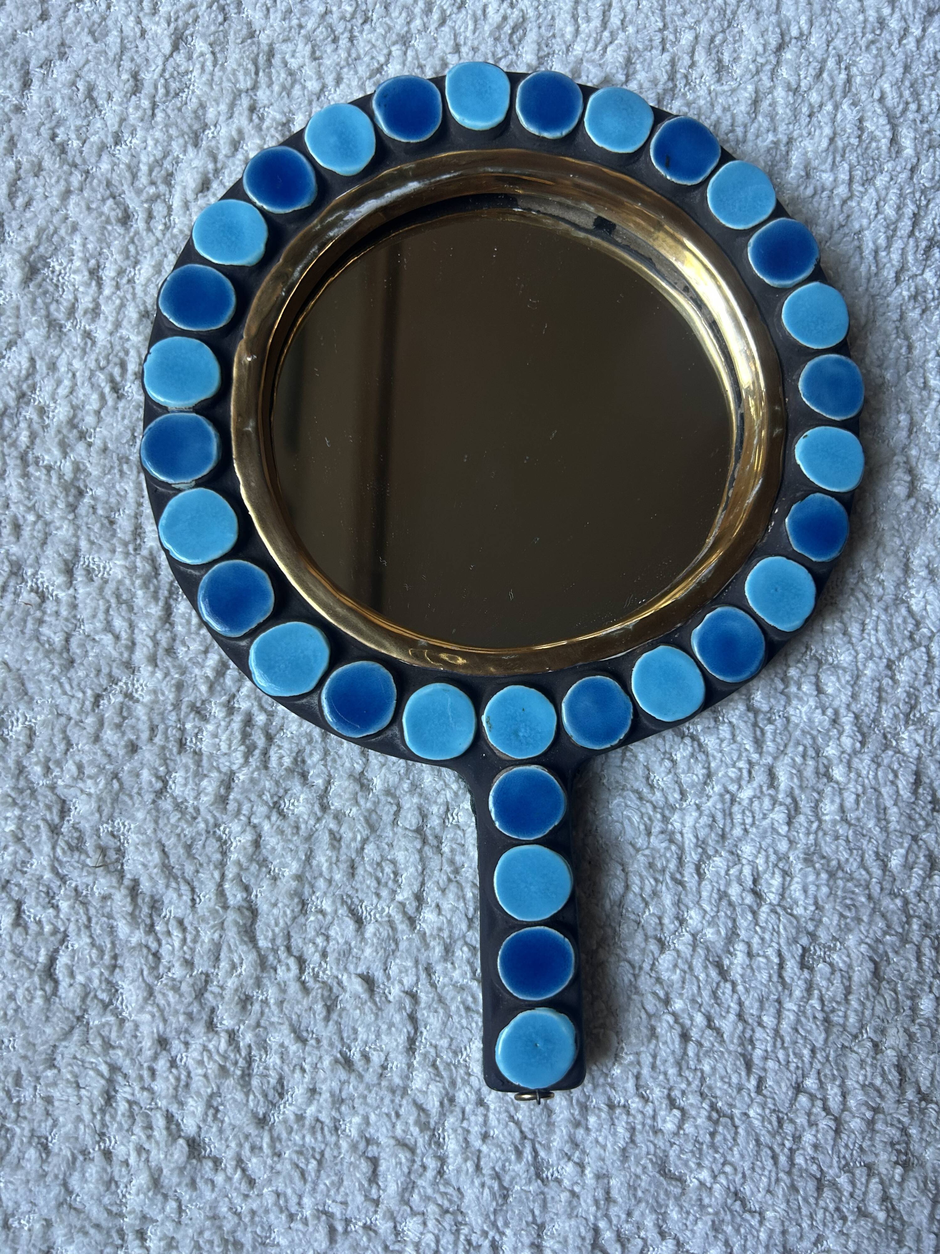 Mithé Espelt handheld mirror