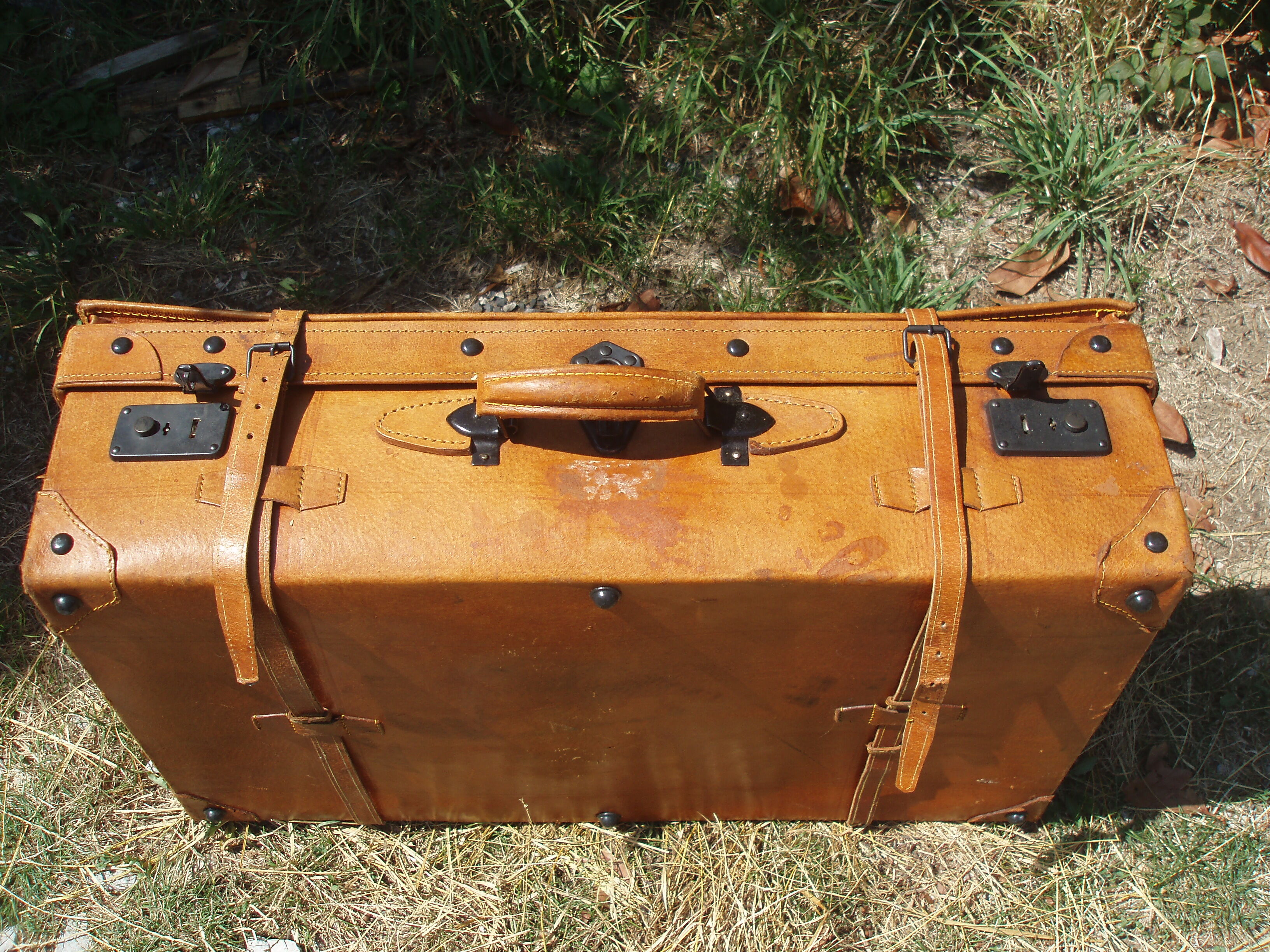 Old quality brown leather suitcase from the 60s