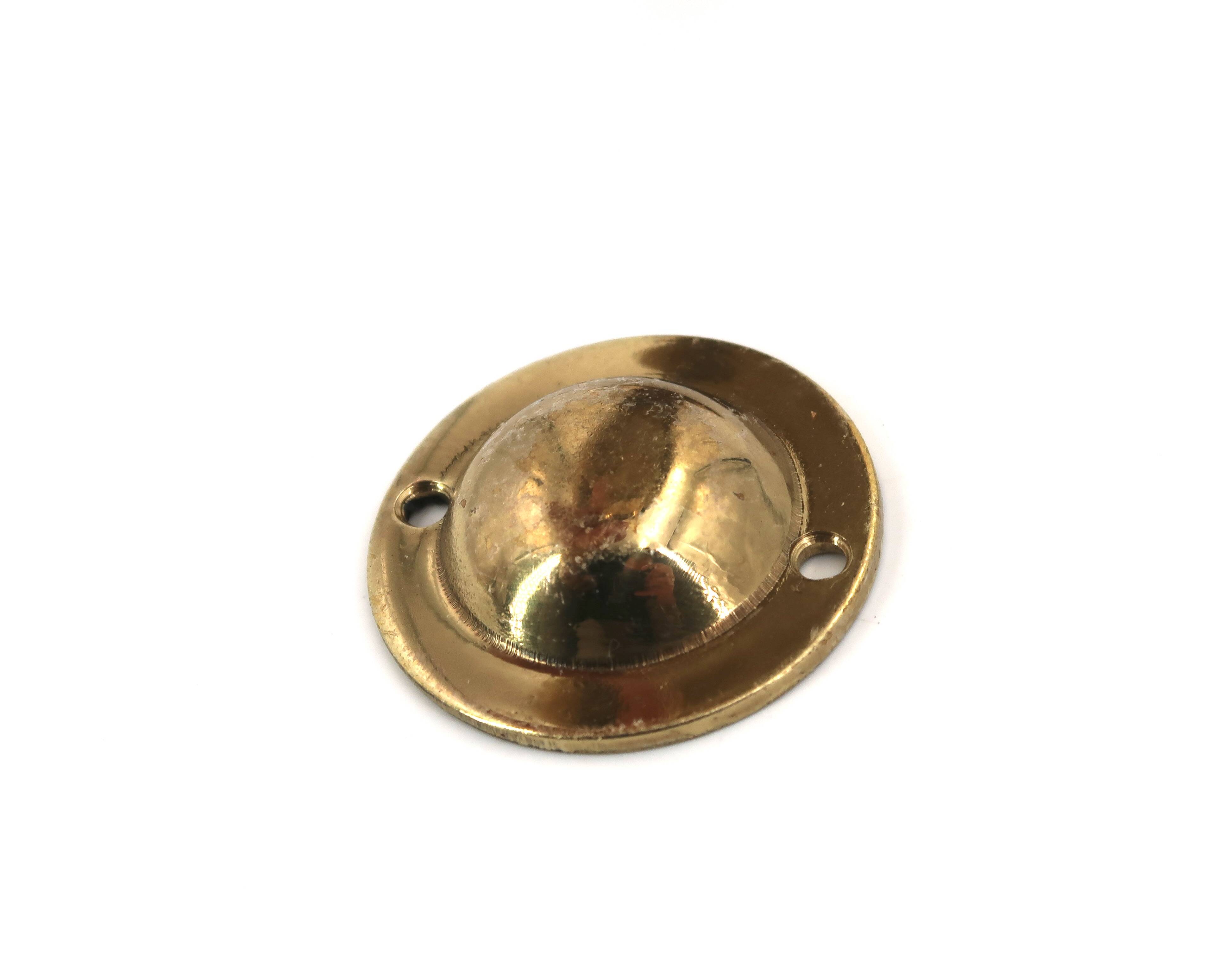 Brass door knocker in the shape of a hand, 1970s.