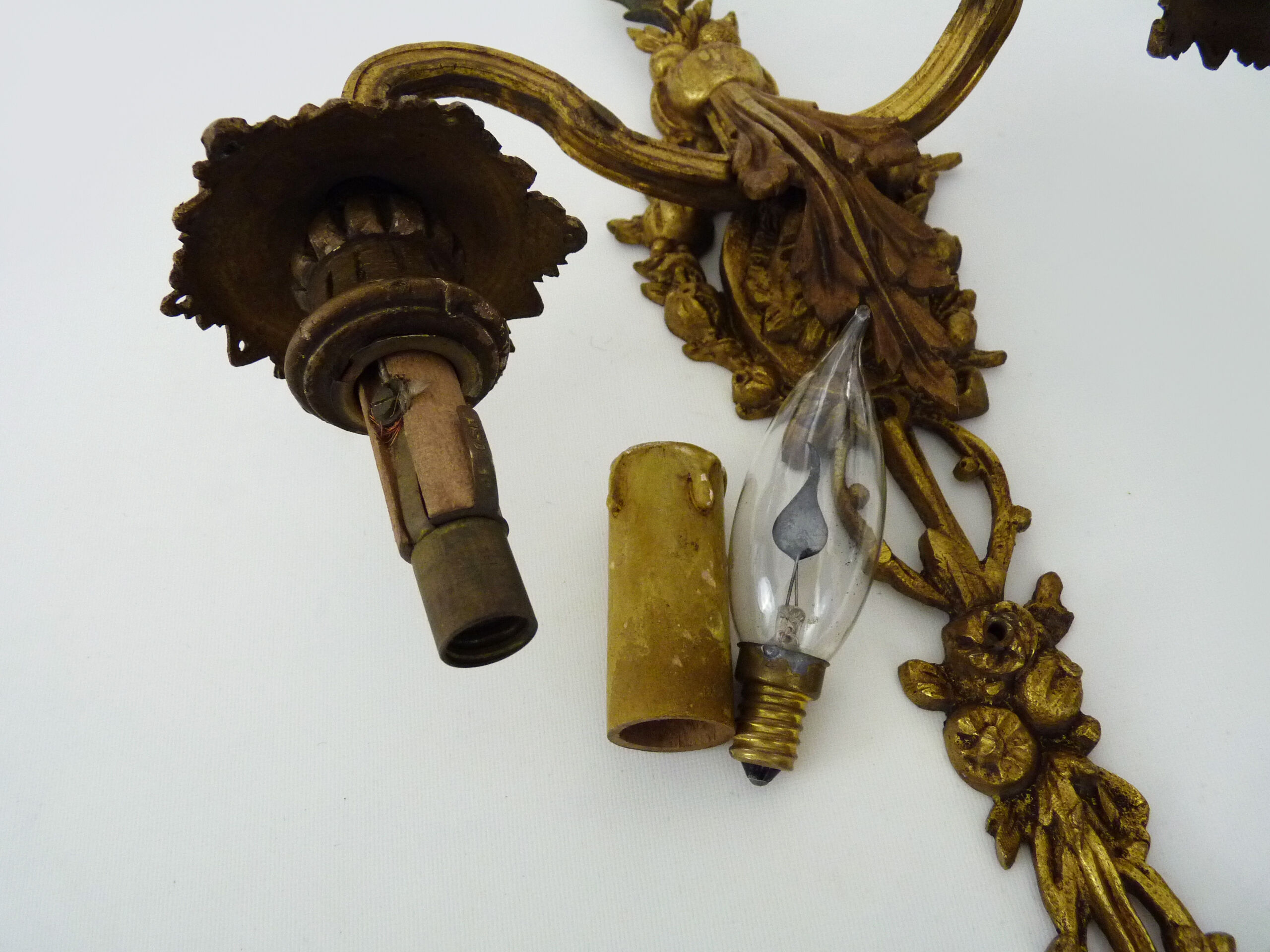 Vintage wall lamp decorated with ribbon and grape. Louis XVI style. XIXth