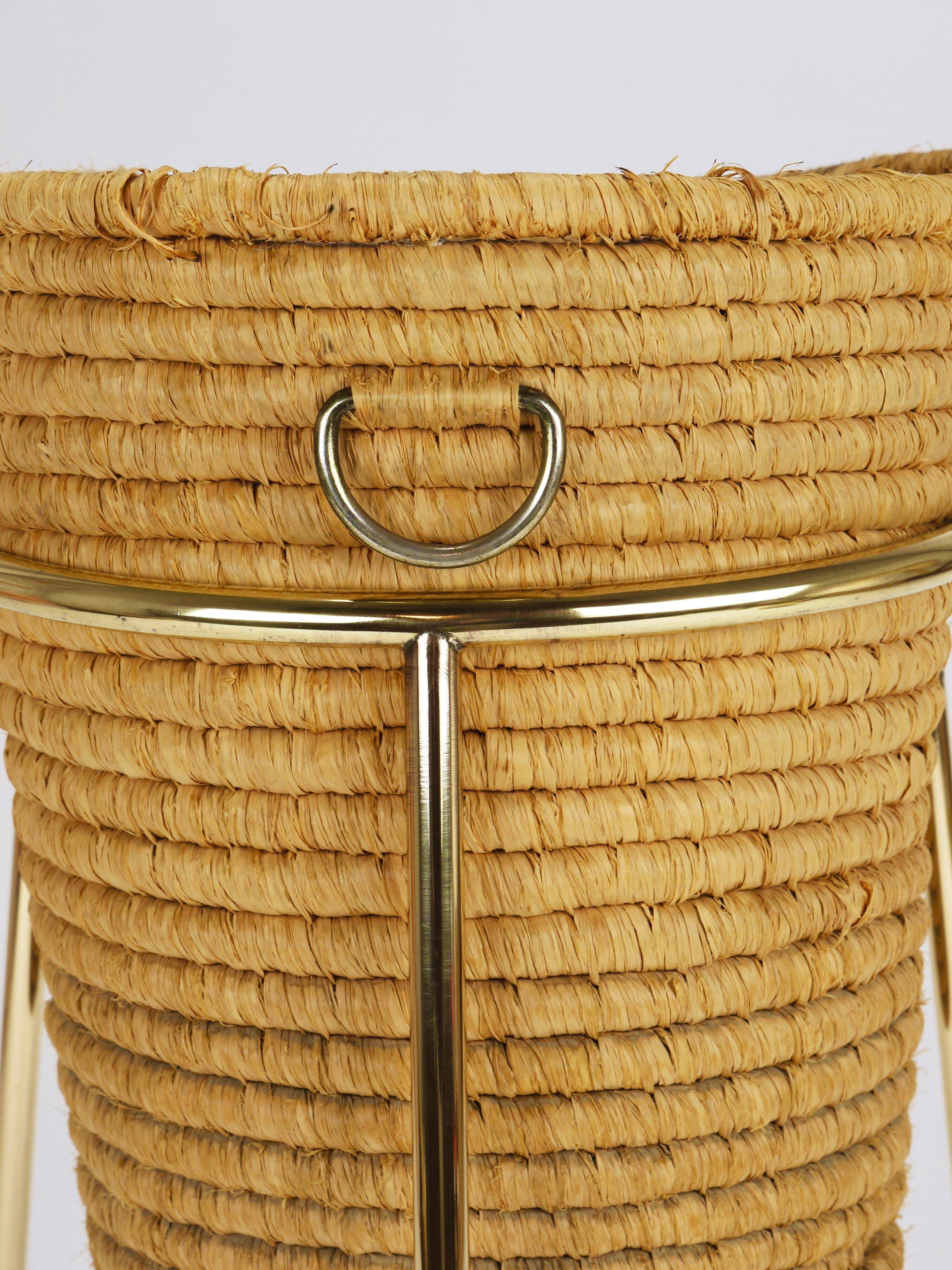 Carl Auböck II paper basket in raffia and brass, umbrella stand, 1950s