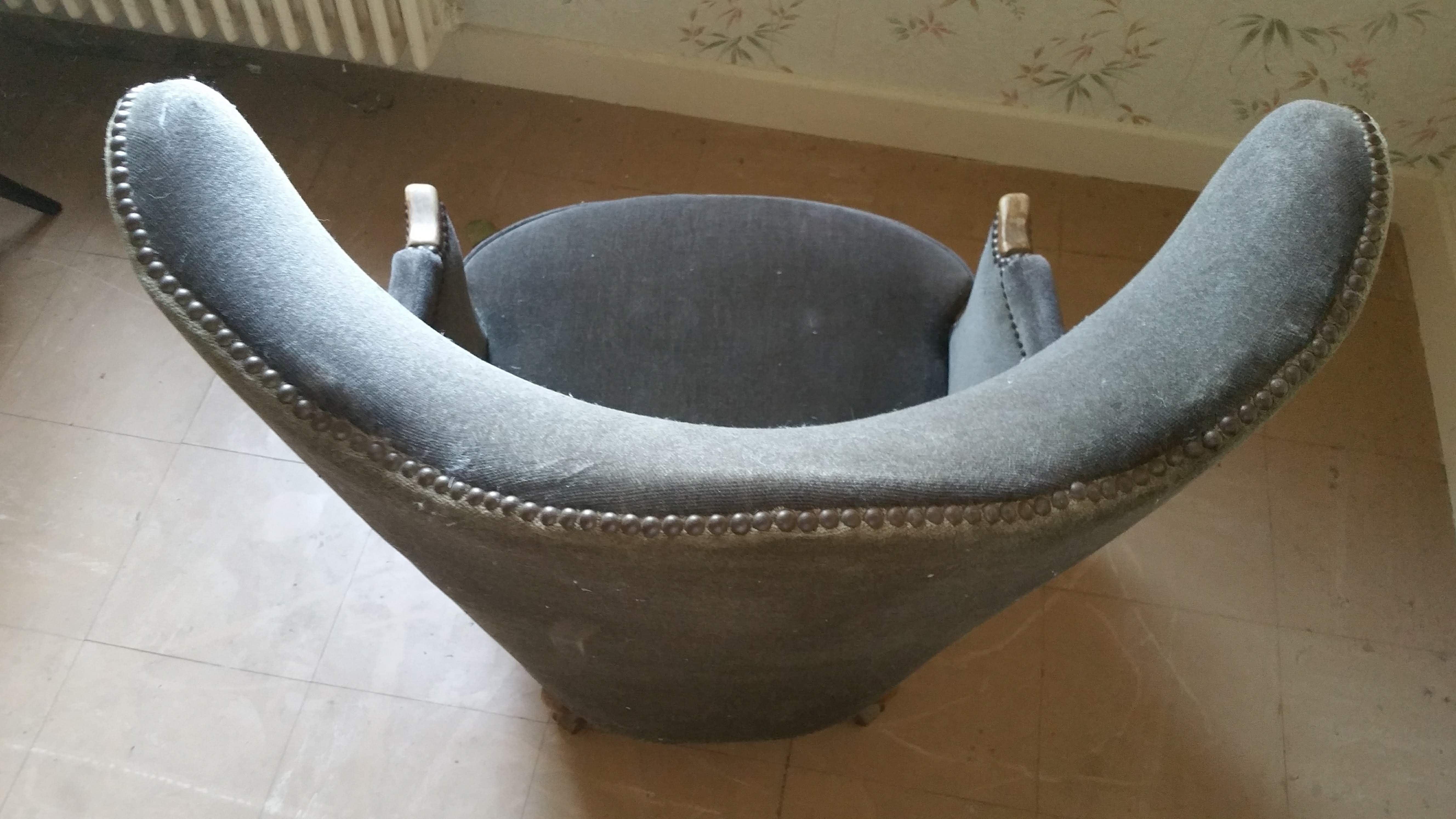 Pair of sculptural Bergère barrel armchairs