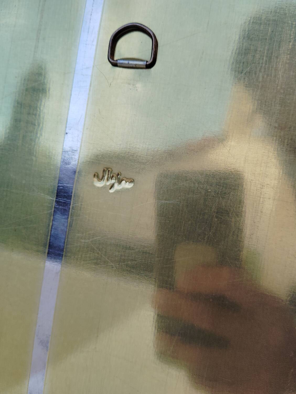 Golden oriental mirror