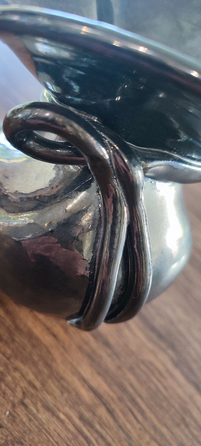 Iridescent ceramic vase from the 1960s, signed